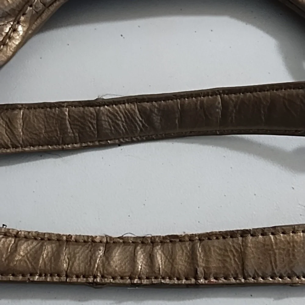 Gold Quilted Shoulder Bag with Chain Handles